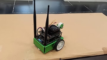 Fung Yang Jetbot robot Jetson Nano collision detection, move and stay inside cardboard platform.