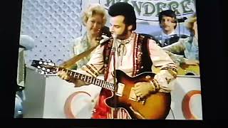 Rick Moranis on Guitar as Linsk Minik