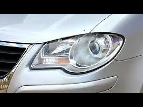 Как заменить лампочку ближнего света в фаре автомобиля VW Touran (2009).