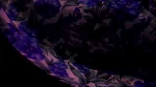 High Heel Dangling With Wind Blowing On Silk Blue Rose Dress.