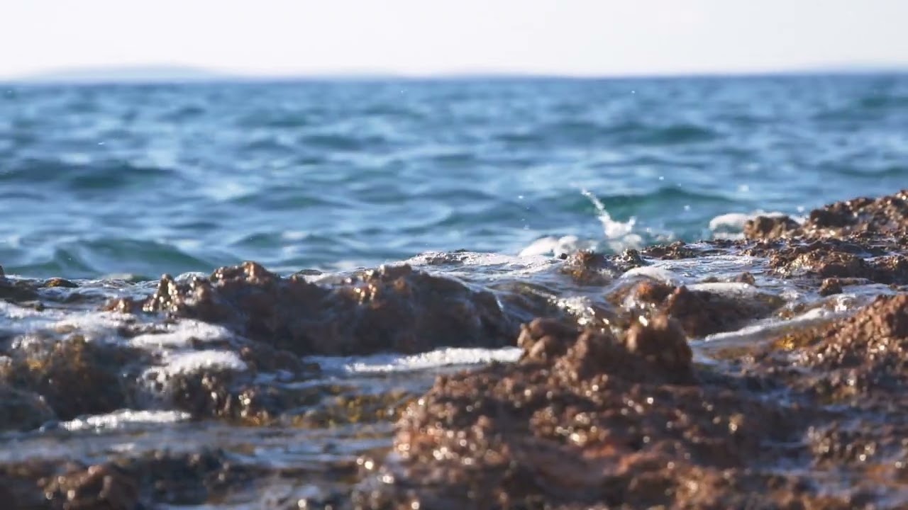 Mediterranean rocky shore, tracking shot slow motion | Free stock footage