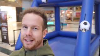 Guy Does Football Trickshots at Shopping Center - 1021008-2