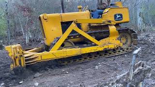 Finishing off a clearing with John Deere 350 Bulldozer