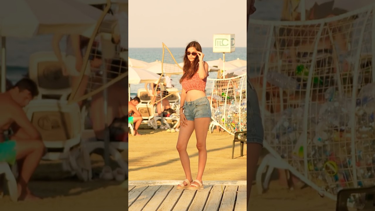 The view that girl photograph on the Mediterranean beach. 