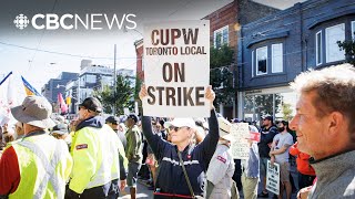 Toronto postal workers rally against proposed changes