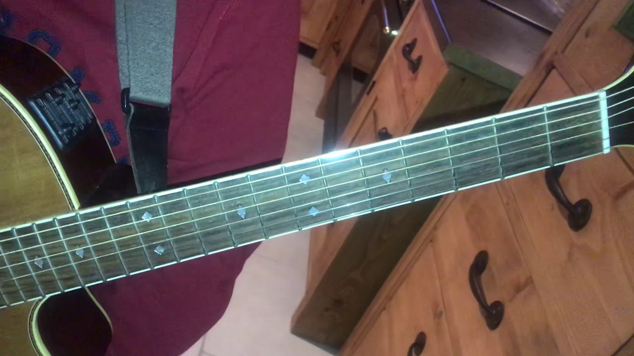 Cantique 23 un vêtement blanc guitare