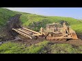 די9 משוריין סוחב את גשר הטנקים Armored D9 bulldozer carrying the tank bridge away