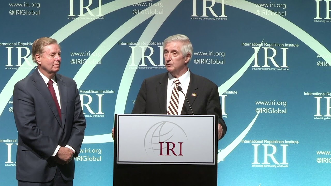 Andrew Card Presents Democracy Service Medal to the Late Senator John McCain