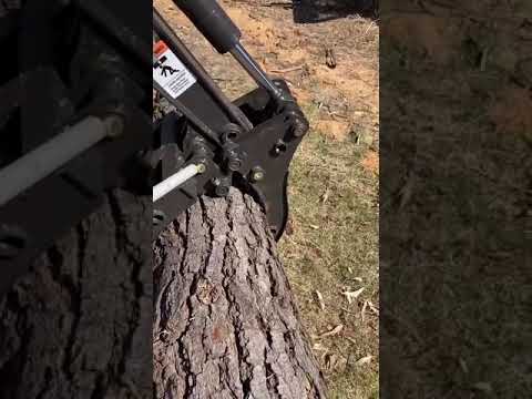 UME10S Mini Excavator is working on grabbing logs