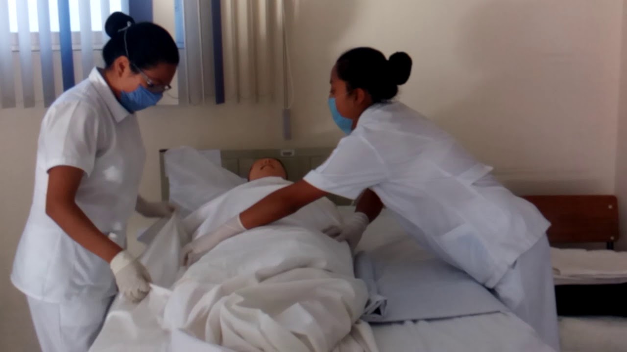 Tendido de cama con paciente. - YouTube