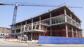 Waco Family Medicine celebrates 'topping out' at new headquarters under construction