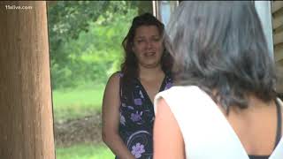 Murder charges dropped against woman who called 911 to report mom's suicide