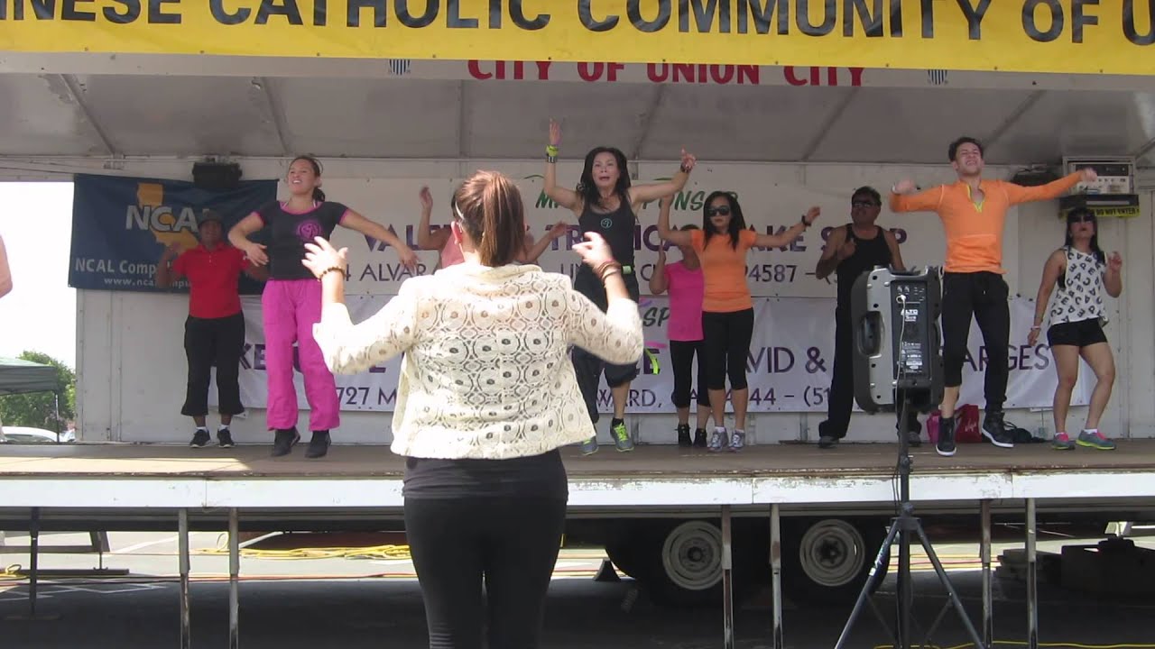 Faye dancing at a Live Demo with her Zumba instructors - YouTube