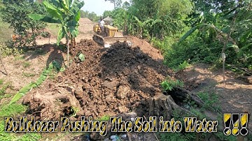 Fantastic bulldozer work ! Mitsubishi bd2f pushing soil into pond and DumpTruck unloading