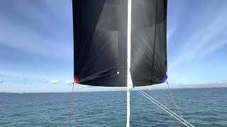 Shane Hughes of North Sails Ireland fitting a symmetric spinnaker