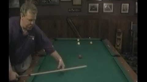 Buddy Hall demonstrates billiard cue-ball position using his Clock System