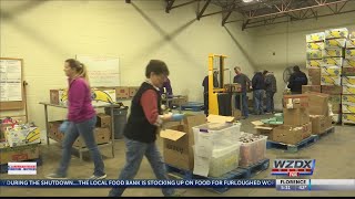 Food banks stock up to help furloughed workers