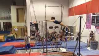 Amy Shen, double front dismount off bars with spot