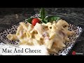 Creamy mac and cheese sauce with extra cheese and bacon