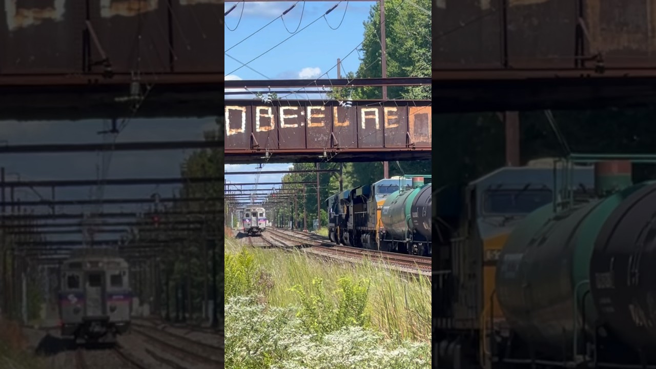 Septa train meets CSX train M404 through Woodbourne PA. 