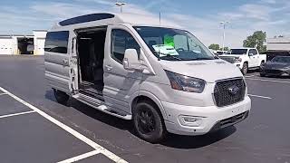 2024 Transit 9 passenger. Sliding door, conversion roof