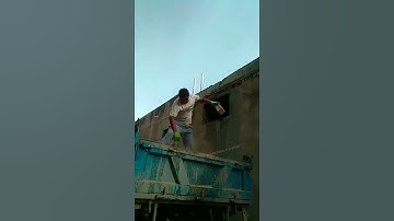 Skilled Worker Single-handedly Catching Bricks