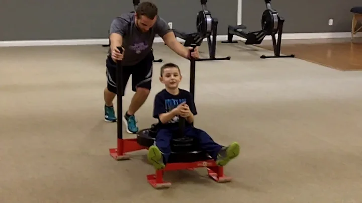 Jason Jaskolka rehabbing knee with sled push, trai...