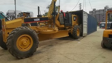 caterpillar motor grader CAT140 fit into 40HQ container loading shipping