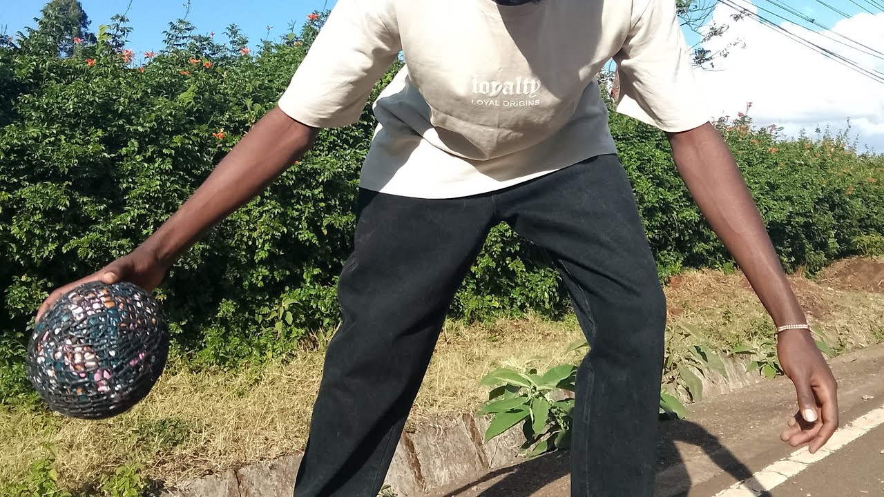 Walking to Kikuyu passed my former highschool  while playing street soccer😌🤣