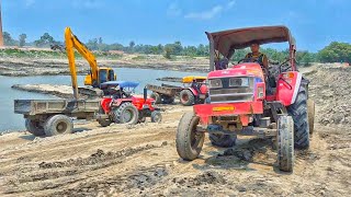 JCB Hyundai 245LR Machine loading mud in Mahindra Arjun Novo 605Di and Mahindra arjun 605 555Di  
