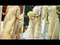 Kerala Christian white & Golden color wedding sarees/ dress