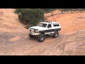 Ford Bronco drives Escalator on Hell's Revenge in Moab Utah.