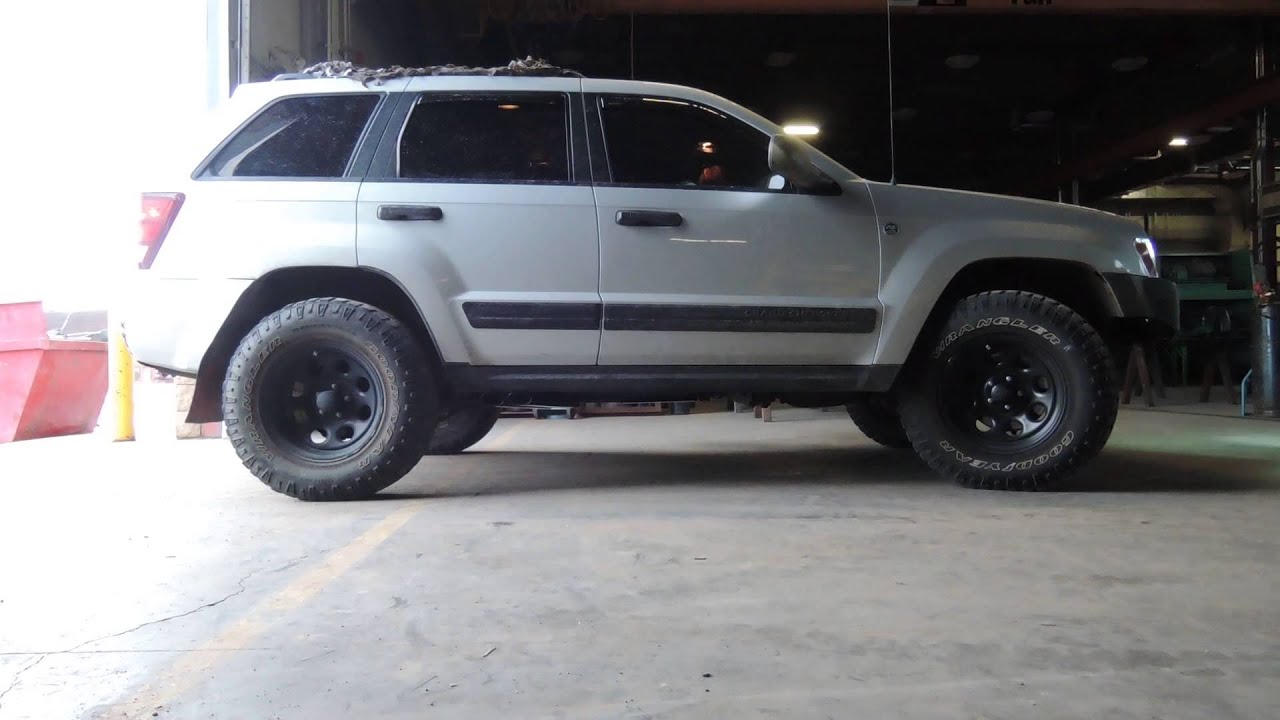 2006 Grand Cherokee custom side exhaust - YouTube