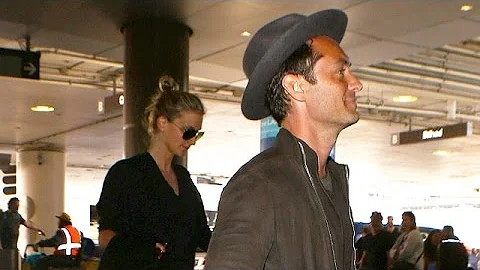 Jude Law And GF Phillipa Coan Arrive At LAX With T...