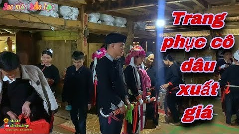 Đám cưới dân tộc sán chỉ mẹ chuẩn bị áo cho con