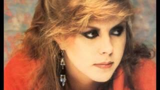 Video thumbnail of "Kirsty MacColl - There's A Guy Works Down The Chipshop Swears He's Elvis (Country Version)"
