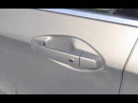 What are the buttons on the door handle of a car for? - Quora