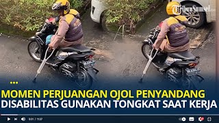 Momen Perjuangan Ojol Penyandang Disabilitas Gunakan Tongkat Saat Kendarai Sepeda Motornya