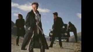 Video thumbnail of "Simple Minds - Alive And Kicking"