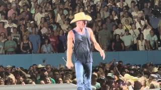 Kenny Chesney and Megan Moroney singing She Thinks My Tractors Sexy