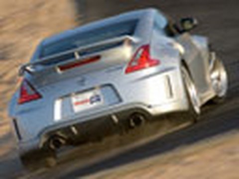 FULL NISSAN 370Z @ INSIDELINE.COM: www.edmunds.com It's called "The Fastest Road in the West" for a reason. Willow Springs International Raceway is known for its staggeringly high lap speeds, and it defines itself with one of the gnarliest, high-speed corner combinations anywhere in the world: a long decreasing-radius bend from Turn 8 to Turn 9. And so in an effort to preserve the world's population of auto scribes like us, Nissan has created a makeshift chicane to successfully emasculate these corners during our test of the 2009 Nissan Nismo 370Z. Smart move. Fortunately there are ample opportunities elsewhere on this track to explore the car's increased performance over the standard 2009 Nissan 370Z. Namely Turn 6, which apexes at a blind crest and is followed on the downhill side by a huge midcorner bump that makes the standard Z-car wallow like a Buick LeSabre over a Wyoming frost heave. It's here that the Nismo Z sells itself. In the Sport Z-car we're afraid. Afraid of physics. Afraid that the track will toss us â like a Buick â into the unforgiving desert. But after a few laps in the Nismo Z, we're confident. And we're faster. We keep our right foot planted all the way over the Turn 6 crest and across the bump, gaining enough speed that a few hundred yards down the track we ingloriously annihilate most of the orange cones that Nissan deployed to keep us alive. Nice.