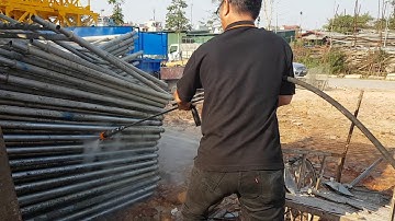 Tẩy sạch bê tông xi măng trên Cốp pha Giàn giáo bằng máy phun nước Denjet