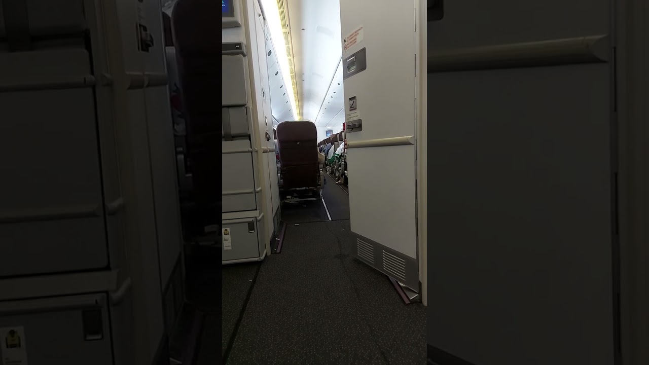 Dedicated Crew Cleaning Toilet. GA B777 300ER. Hajj Pilgrim Flight Home.