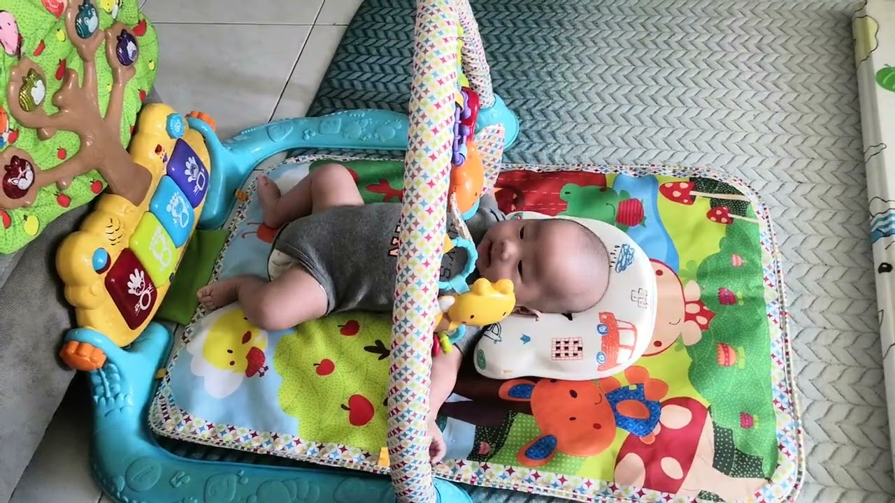 Noah playing Vtech's 4 in 1 Infant Baby Gym Playmat 1 March 2021