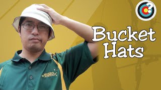 Olympic archers wear bucket hats 