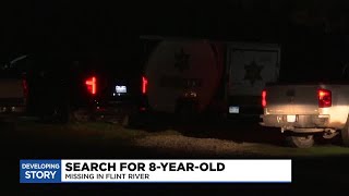 After one child drowned, crews are looking for another in Flint River