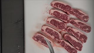 Cutting A Usda Prime Grade Striploin Into Strip Steaks