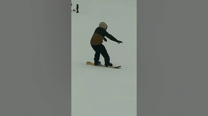 More of Robb on his first day snowboarding.