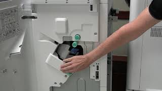 How do I replace the staple cartridge on my copier or printer?