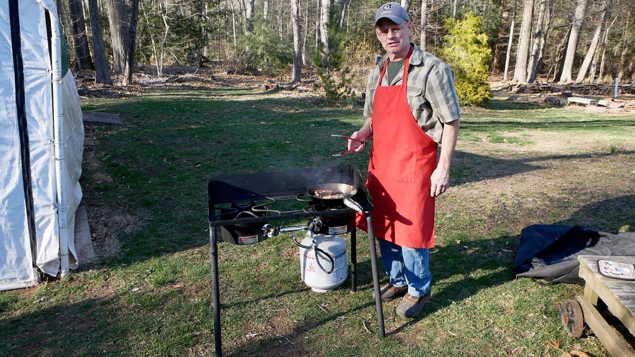 Cooking freshly caught trout using the Camp Chef Explorer Stove, and a